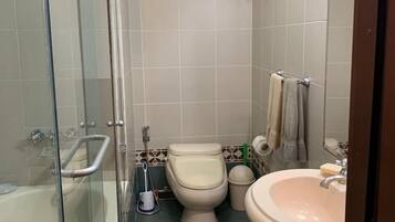 Shower, hair dryer, towels, soap