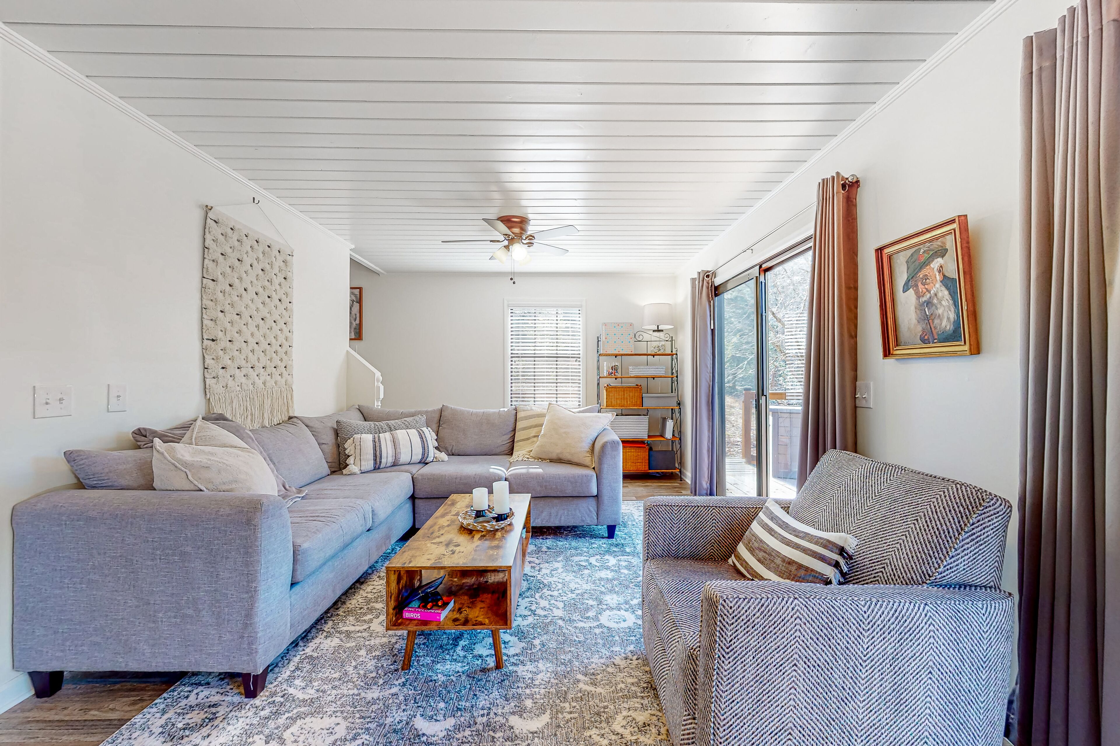 Spacious creekside home with deck, firepit, grill, water views, & washer/dryer