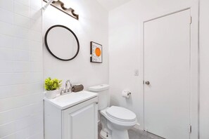 Shower, hair dryer, towels, shampoo