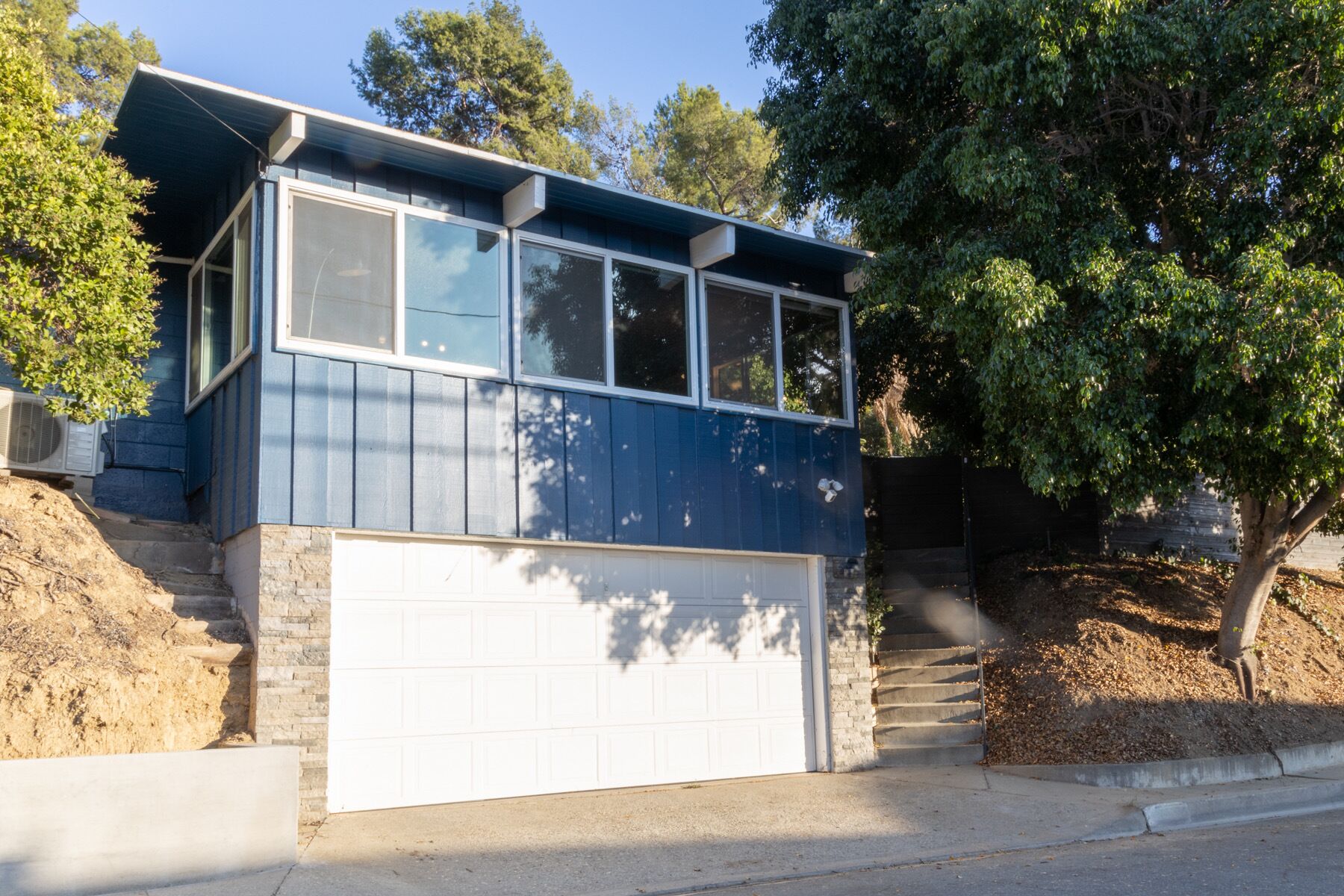 Modern hilltop home with beautiful views and private backyard