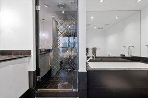Bathtub, hair dryer, towels