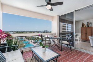 Outdoor dining - Beachfront Paradise with Private Beach Access, Pools, Tennis, Cabana Rentals & More at Palm Bay Club (Siesta Key)