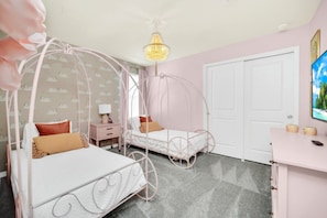 A bedroom with a canopy bed, a desk, and a television. - Secluded 10 Bedroom Villa With Ocean Views 6282 (Davenport)