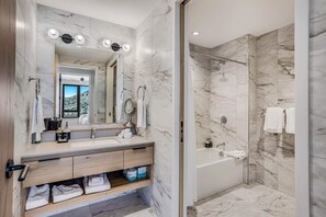 Bathtub, hair dryer, towels