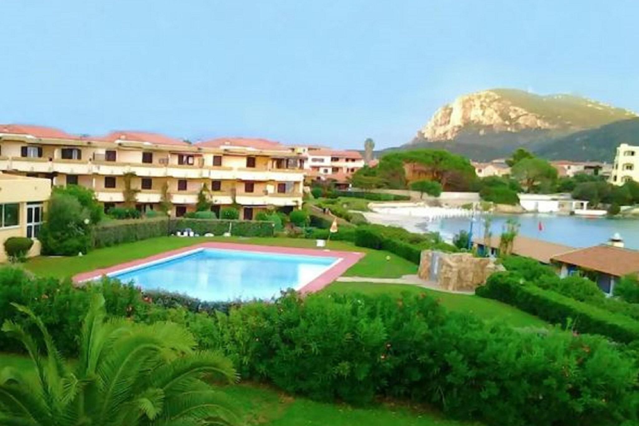 Cosy holiday home in Marinella with shared pool