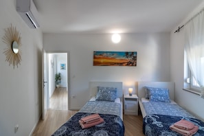 2 Schlafzimmer, Zimmersafe, Bügeleisen/Bügelbrett, Reisekinderbett
