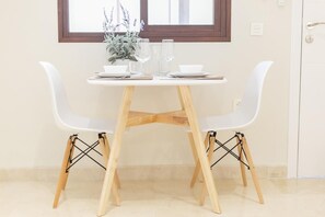 Superior Standard Apartment | Living area | 32-inch Smart TV with digital channels, TV - Hoteles del Sur (Seville)