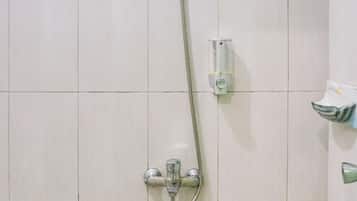 Deluxe Double Room | Bathroom | Shower, rainfall showerhead, towels, soap