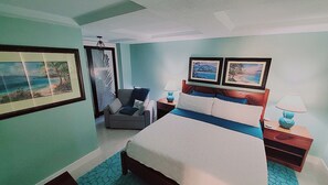 1 habitación, tabla de planchar con plancha y cuna de viaje