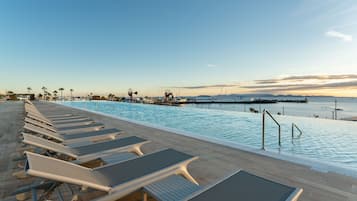 Outdoor pool, pool umbrellas, pool loungers