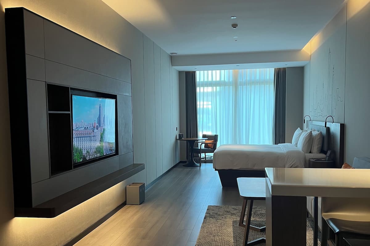 Executive Room | Premium bedding, blackout drapes, iron/ironing board, free WiFi