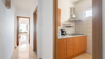 Panoramic Studio, Sea View | Private kitchen | Full-sized fridge, microwave, stovetop, electric kettle