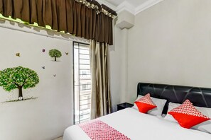 Deluxe Double Room | Bed sheets - OYO 91296 Nagoya Guesthouse (Batam)