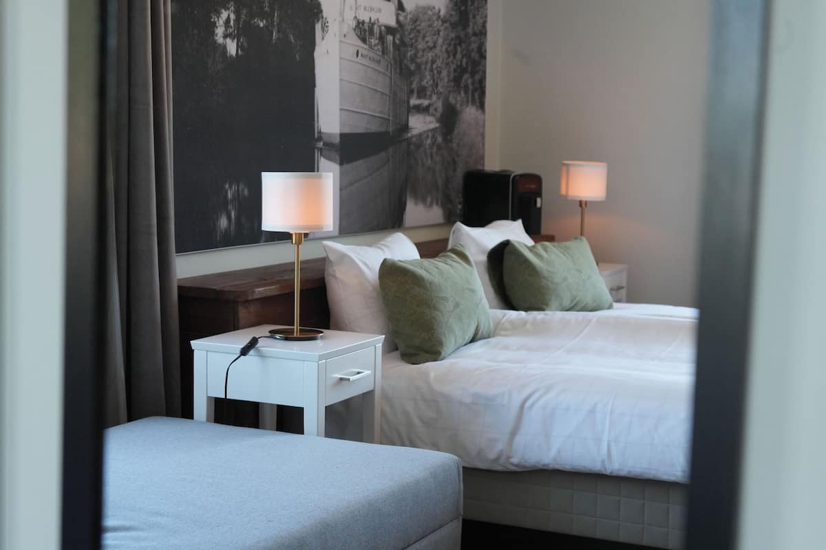 Triple Room | Individually decorated, desk, blackout curtains, iron/ironing board