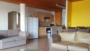 Premium Chalet | Living area | 32-inch LCD TV with satellite channels