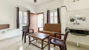 Premium Room | Living area | LED TV, fireplace