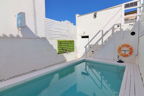 Outdoor swimming pool in a house in Mallorca, perfect for the hot weather.