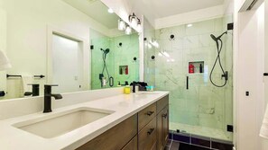 Combined shower/tub, hair dryer, towels, soap