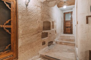 Deluxe Room, 1 King Bed | Bathroom | Shower, designer toiletries, hair dryer, bathrobes