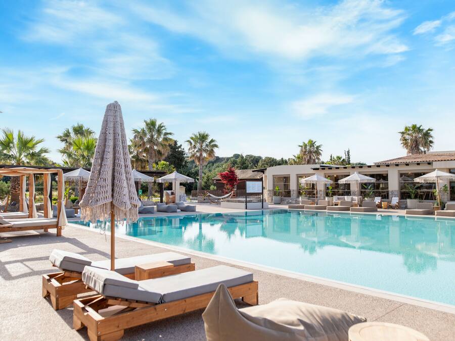Seasonal outdoor pool, pool umbrellas, pool loungers