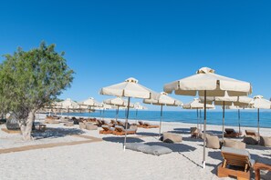 Private beach, sun loungers, beach umbrellas