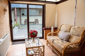 Ferienhaus | Wohnbereich | Kamin