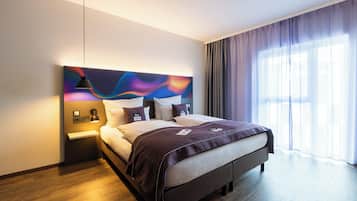 Habitación Premium | Ropa de cama hipoalergénica y caja de seguridad en la habitación
