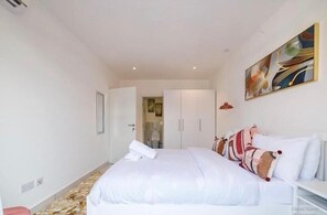 Apartament | 1 dormitori, planxa i posts de planxar i wifi gratuïta 