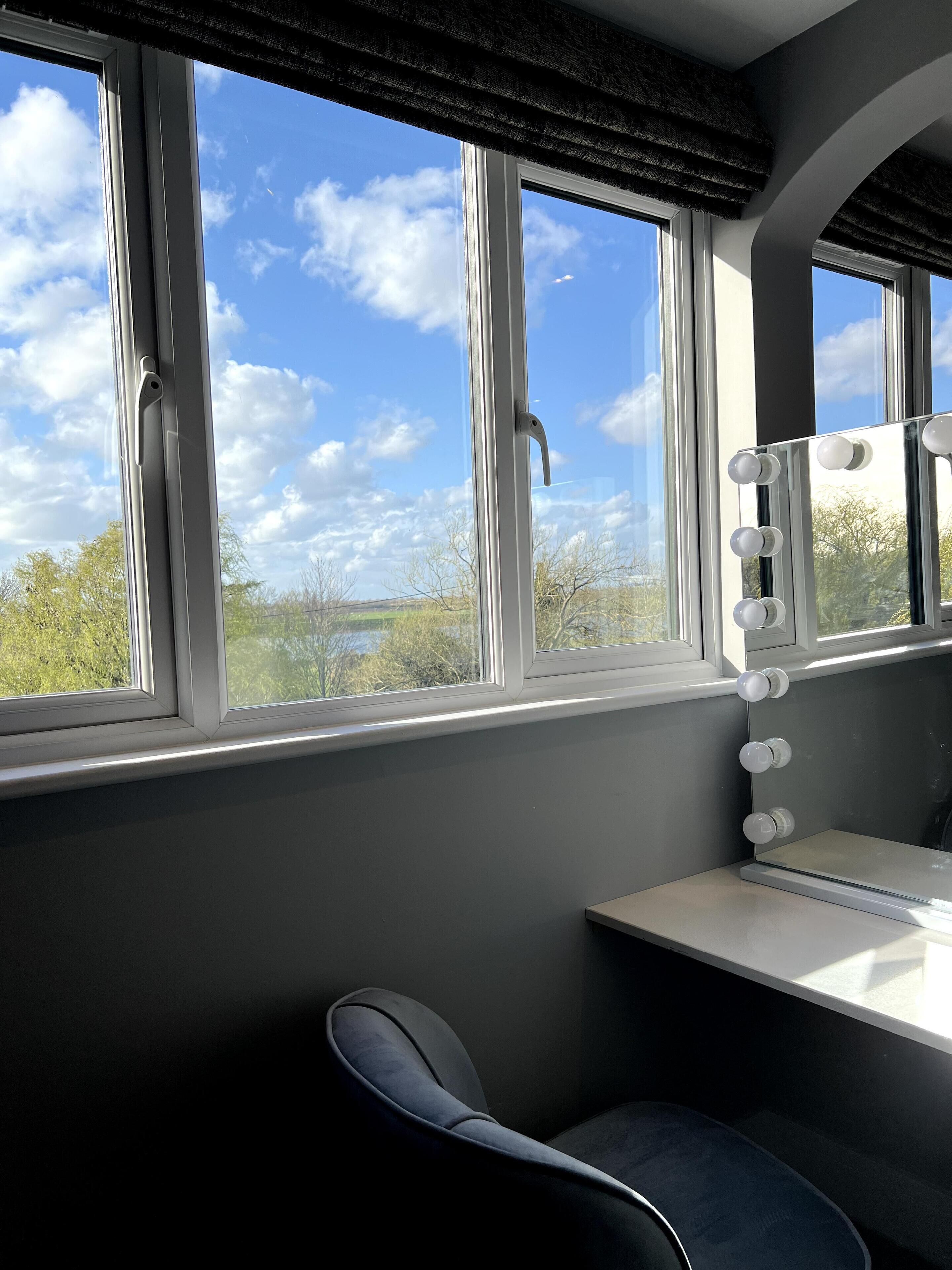 Deluxe Room, 1 King Bed, River View | Living area | Smart TV