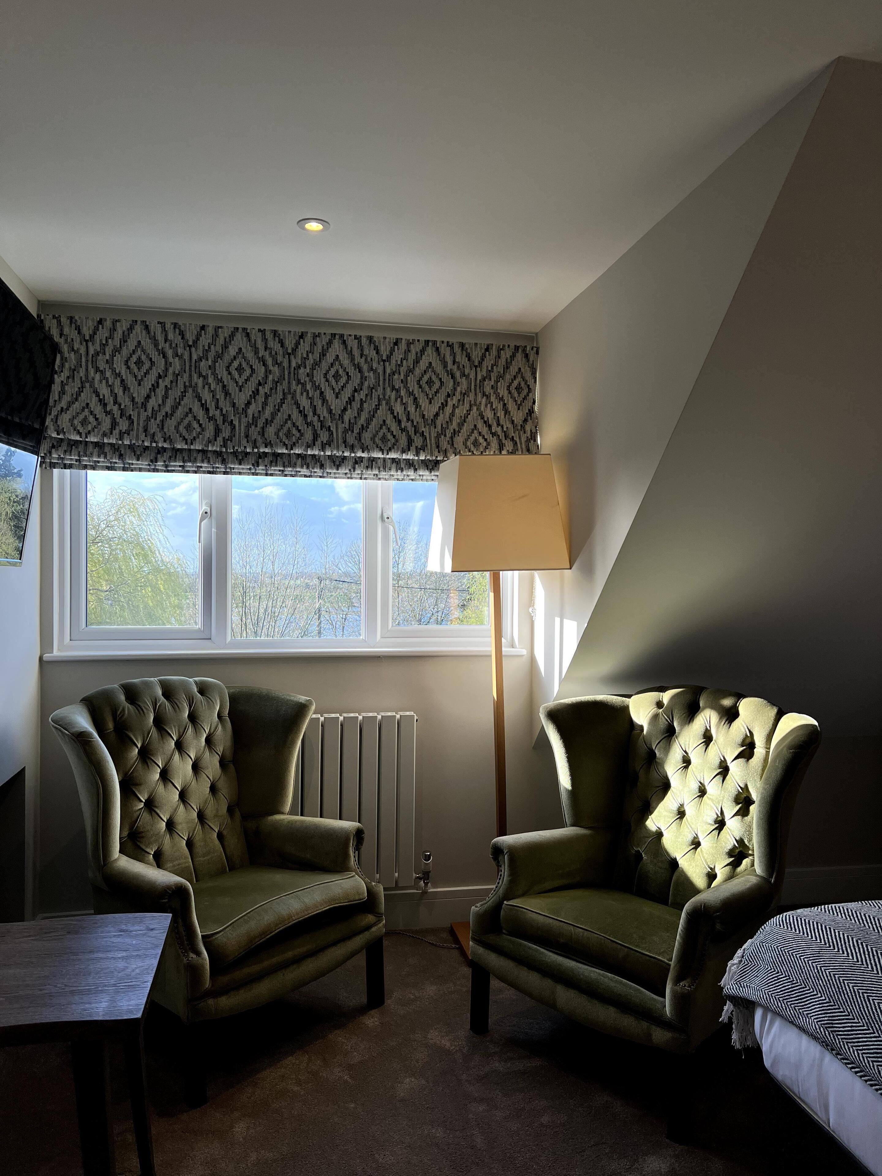 Deluxe Room, 1 King Bed, River View | Living area | Smart TV