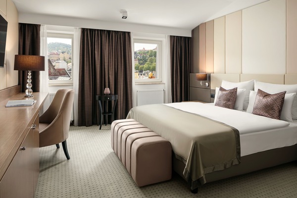 Appartamento, balcone, vista città | Biancheria da letto di alta qualità, minibar, una cassaforte in camera