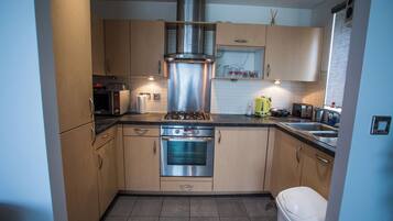 Apartment | Private kitchen | Fridge, microwave, oven, stovetop