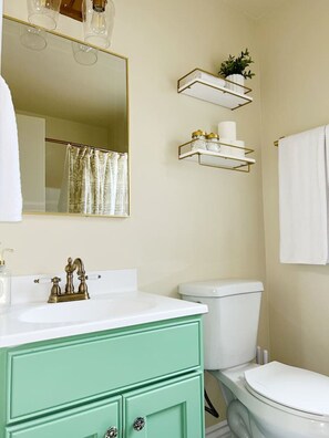 Bathtub, hair dryer, towels