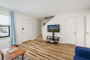 TV, fireplace - Shore Beats Work by Seaside Vacations & Sales (Chincoteague Island)