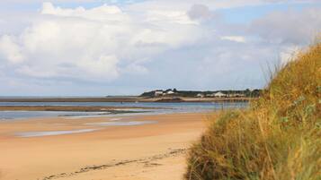Enjoy the serene coastal views and tranquil atmosphere of this seaside retreat.