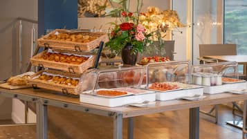Daily buffet breakfast (EUR 28 per person)