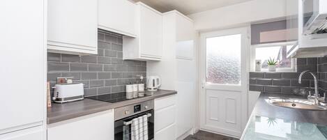 Fridge, oven, dishwasher, high chair