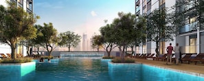 A modern pool area with a clear view of the city skyline in the background. - Nasma Luxury Stays - One Park Avenue (Dubai)