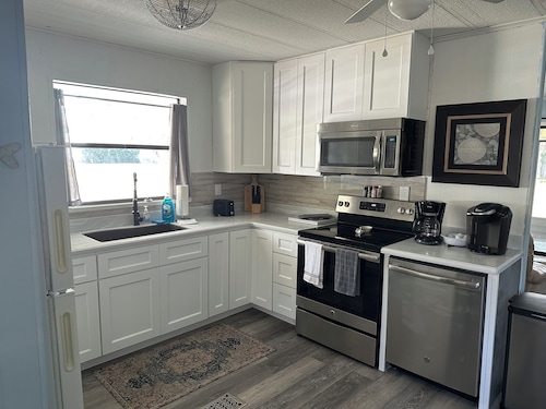 Peaceful Waterfront Home on St. Johns with large porch and dock.