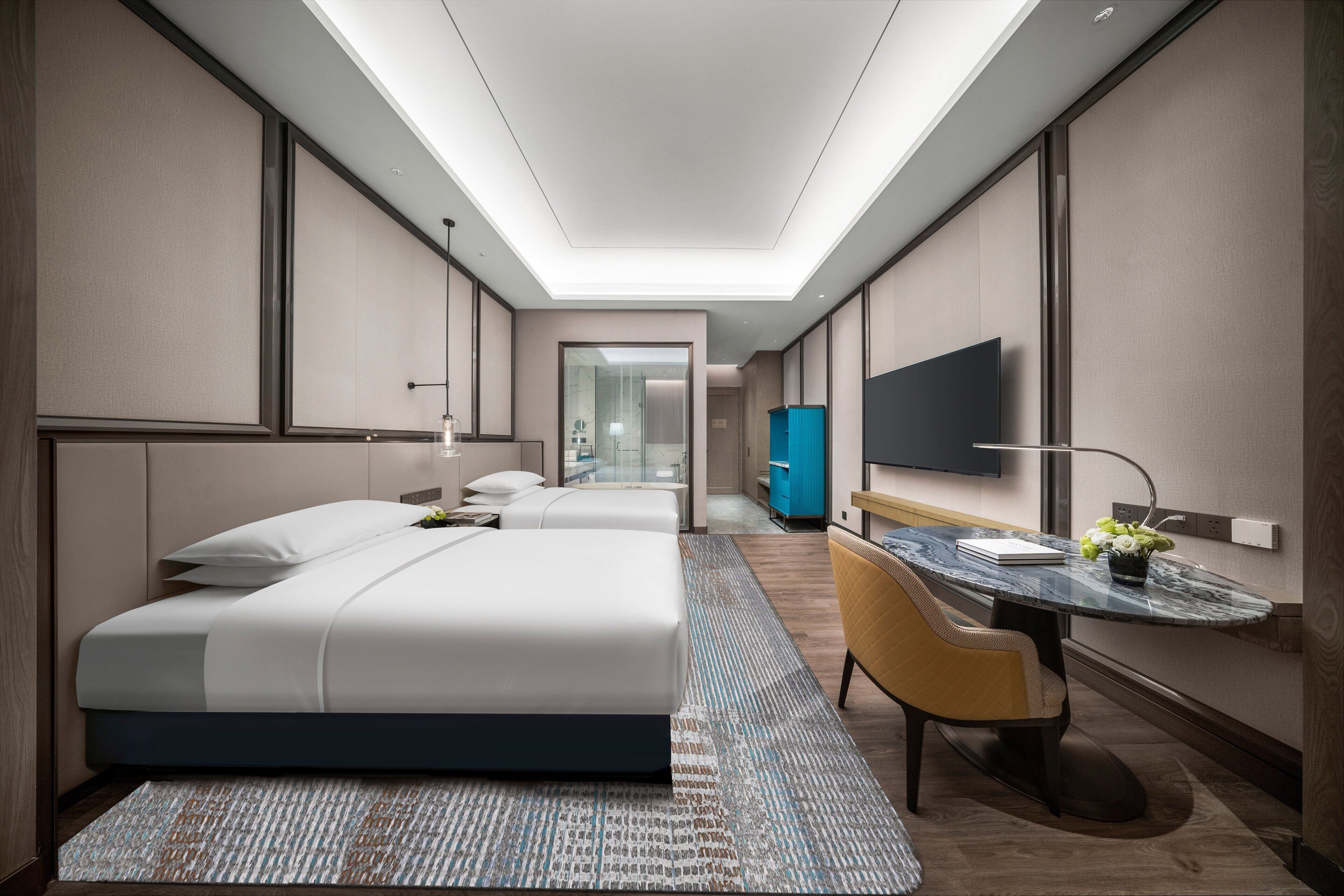 Ropa de cama de alta calidad, cubrecamas y minibar 