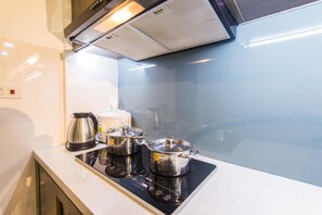 Appartement Ville | Cuisine privée | Réfrigérateur, micro-ondes, plaque de cuisson, cuiseur de riz