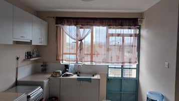 Apartment | Private kitchen | Fridge, microwave, oven, stovetop