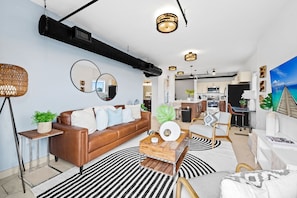 Deluxe Suite, Kitchen, Pool View | Living area | 55-inch Smart TV with digital channels, TV - Wilton River Suites (Adults Only) (Wilton Manors)