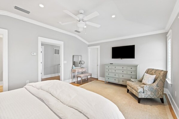 A bedroom with a bed, a vanity with a mirror, a dresser, and a chair. - Spacious Seagrove Escape Cart Bikes Pool Near Beach (Santa Rosa Beach)