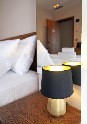 Egyptian cotton sheets, premium bedding, down duvets, memory-foam beds