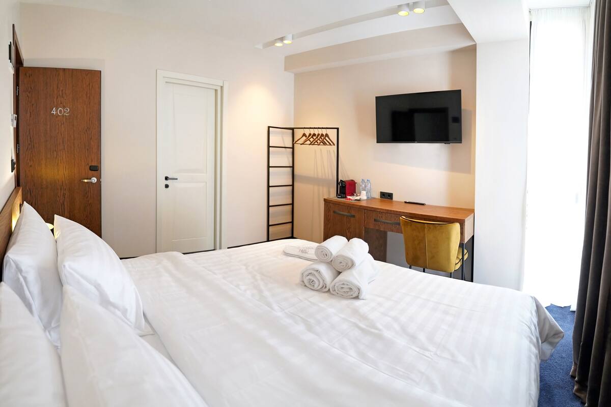 Egyptian cotton sheets, premium bedding, down duvets, memory-foam beds