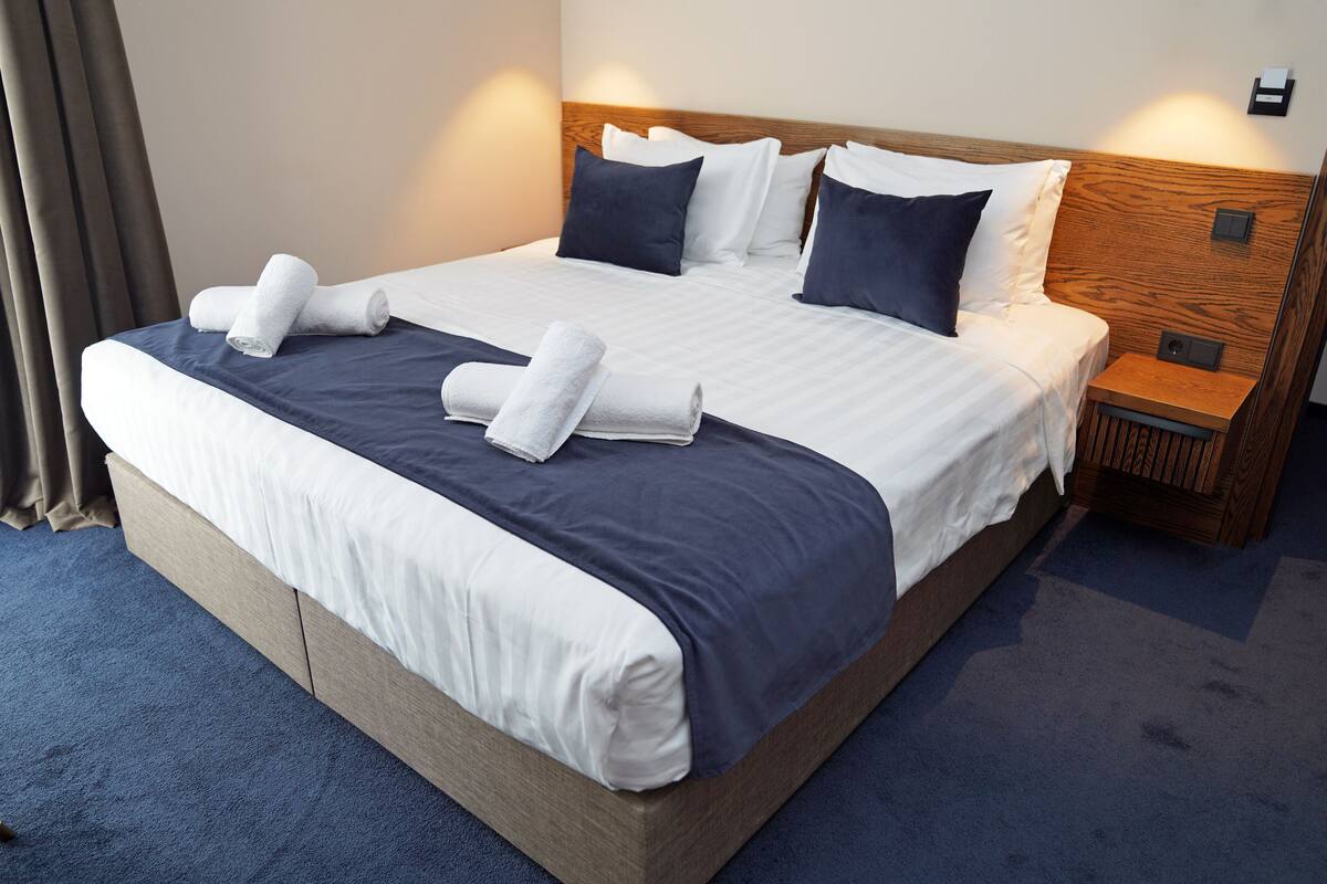 Egyptian cotton sheets, premium bedding, down duvets, memory-foam beds