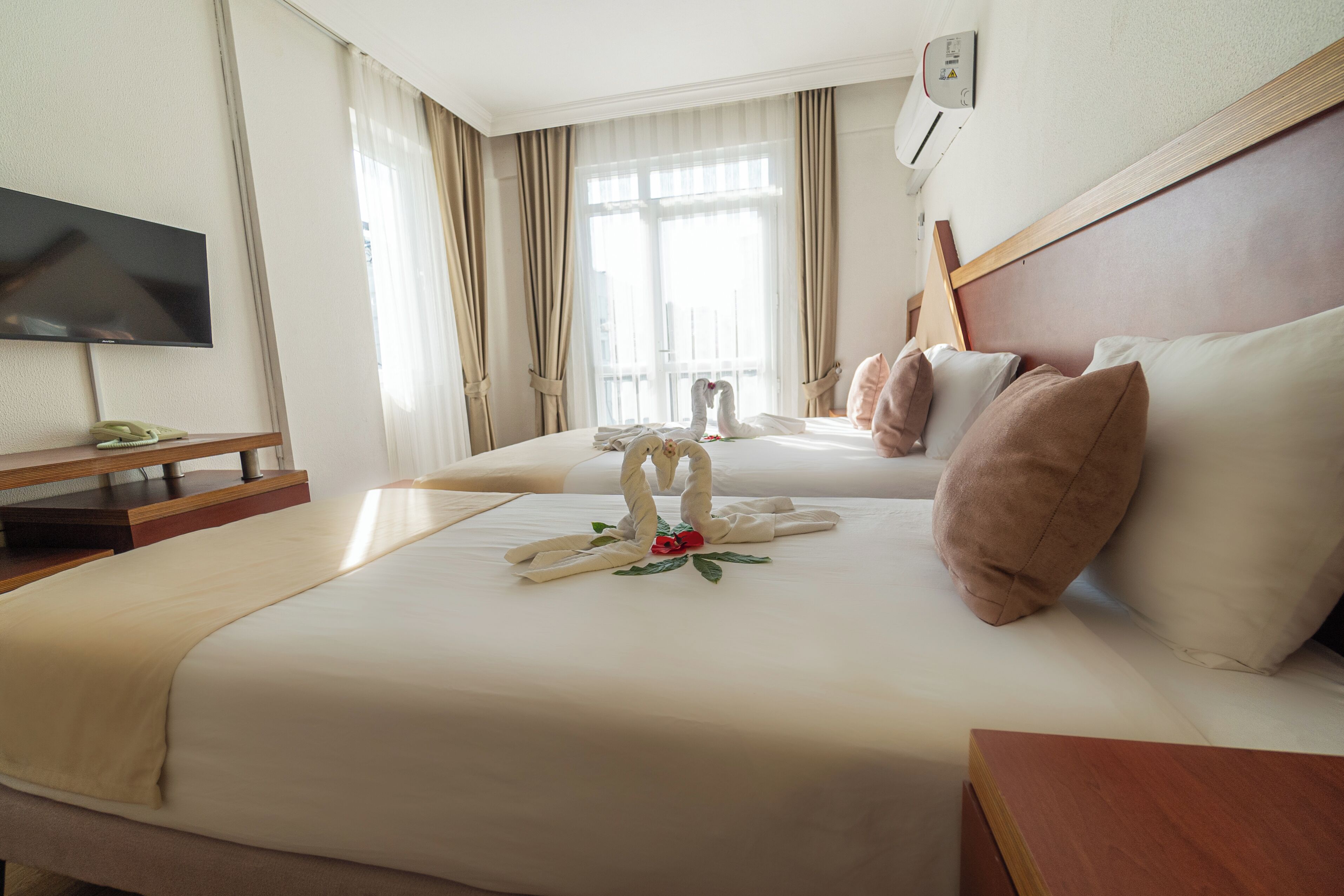 Family Triple Room | Egyptian cotton sheets, premium bedding, Select Comfort beds, minibar