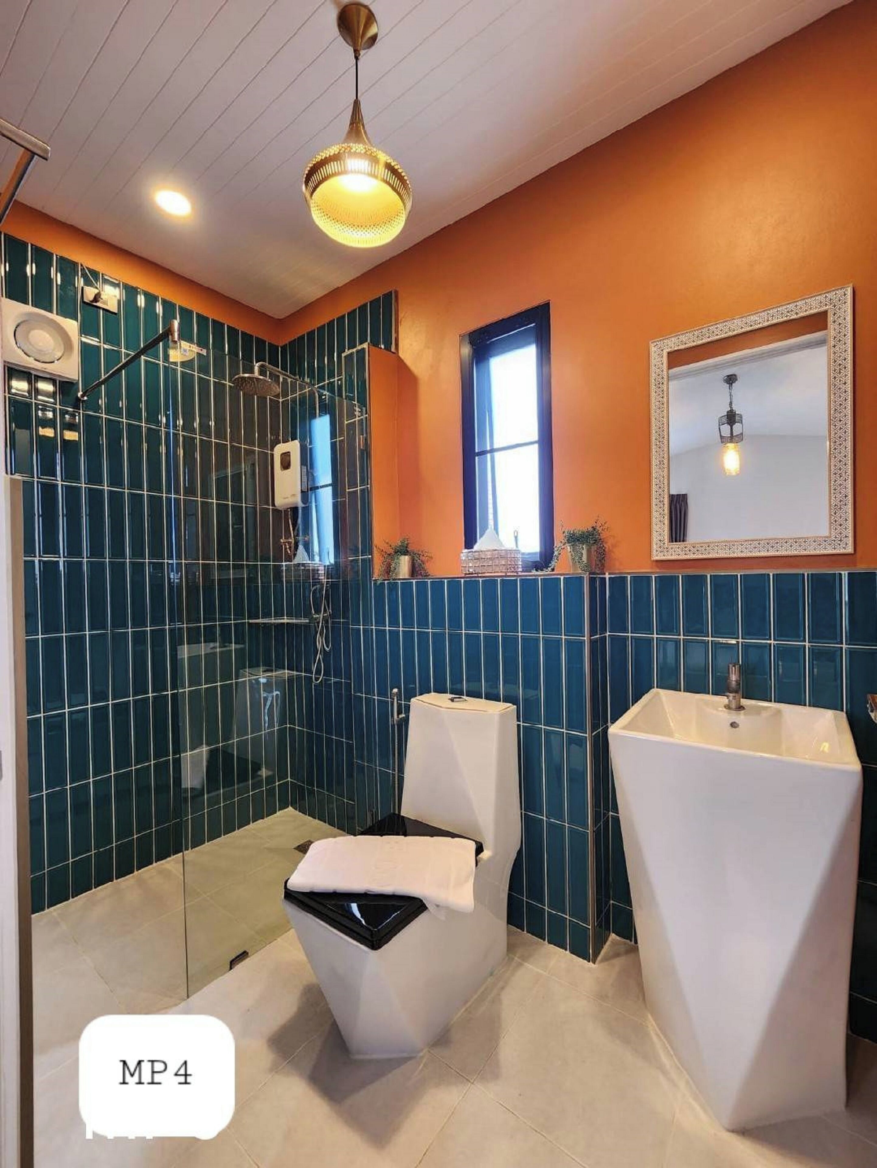 economy studio suite | bathroom | shower, rainfall showerhead, towels, soap