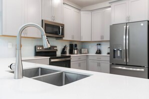 Microwave, dishwasher, highchair, paper towels